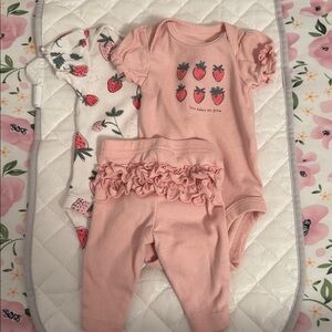 Carter's Pink onesie and strawberry onsie with matching pink ruffle pant